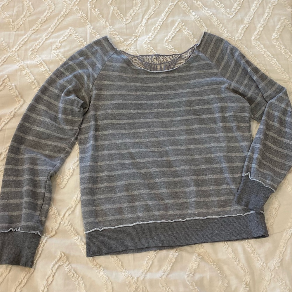 Vanity off the shoulder sweater with lace detail